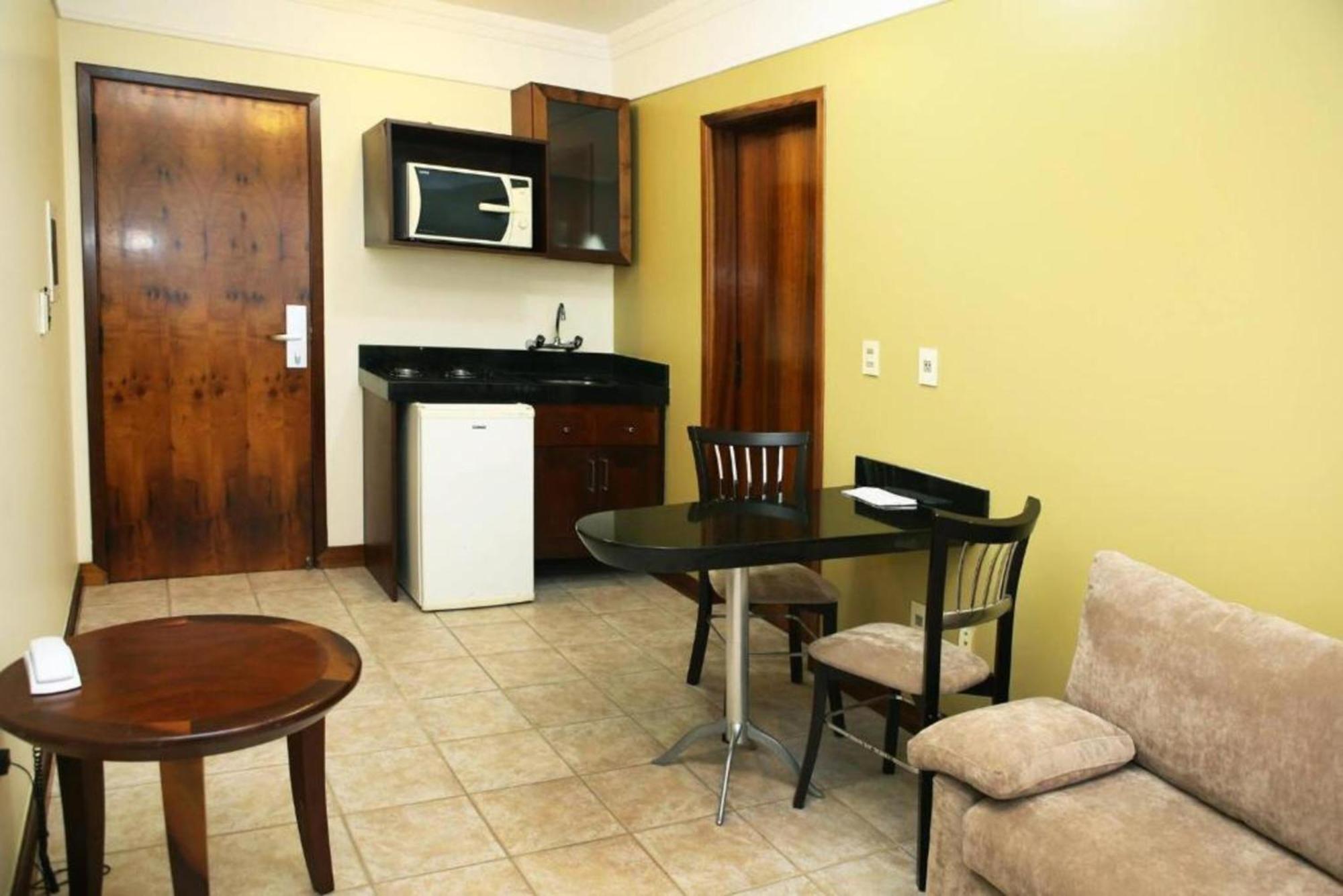 Le Village Flats E Hotel Joinville Habitación foto